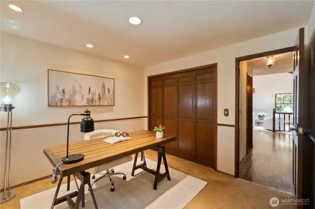 Main floor bedroom staged as an office