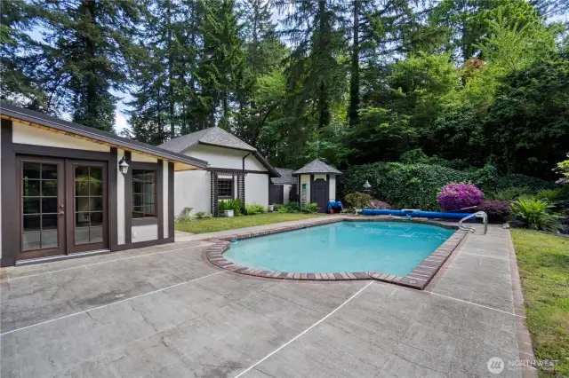Charming in-ground pool in a private oasis! There's also a quaint pond in the far corner of the property with a fully-functional waterfall feature.