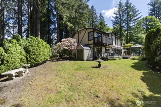On the other side of the house is open space to be enjoyed! A great space to garden, toss the ball, and store things in the shed on this side of the property.