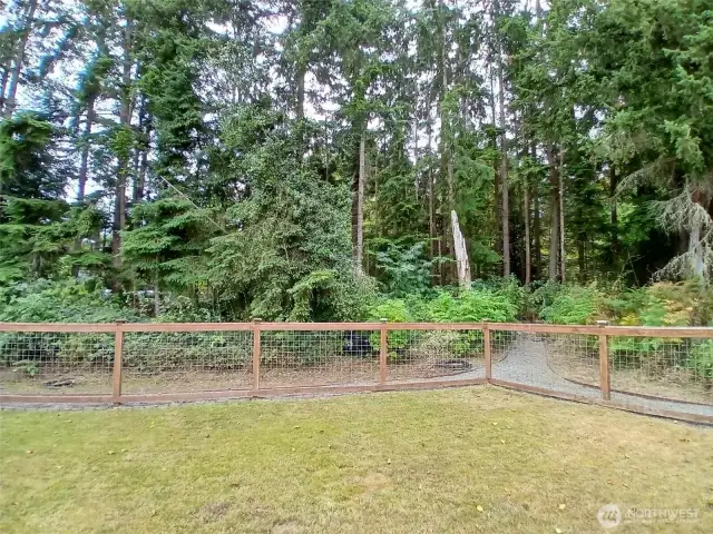 Fully fenced backyard backs onto a greenbelt for the ultimate in scenery and privacy.