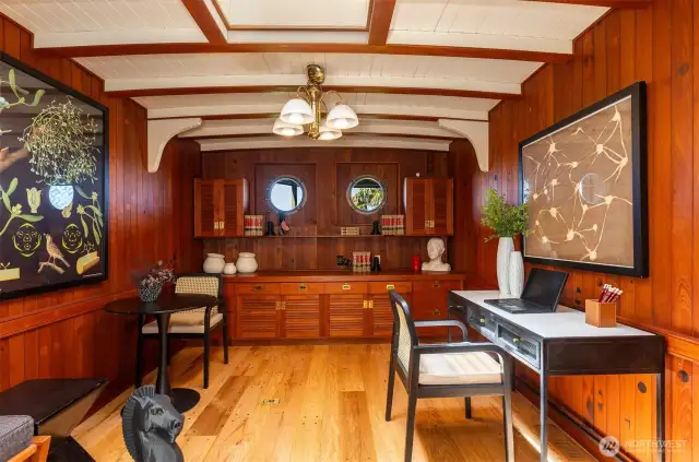 Check out this great office/den/Speakeasy on the main floor! Reminiscent of a ships stateroom, this cozy spot is  very inviting.