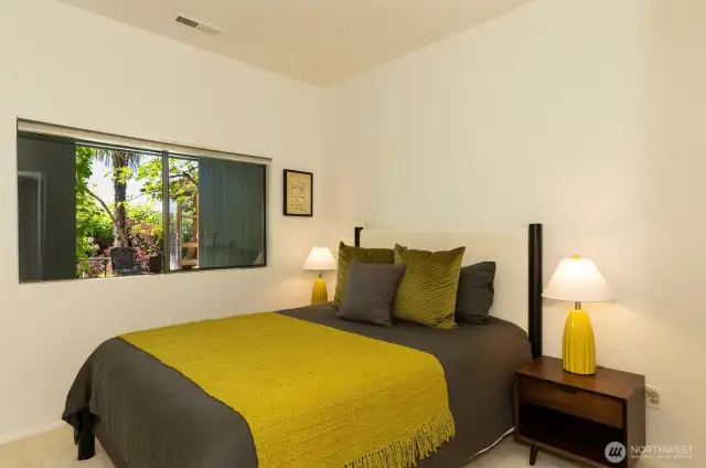 One of the three bedrooms on the lower level with garden views.  This one has an ensuite three-quarter bath.