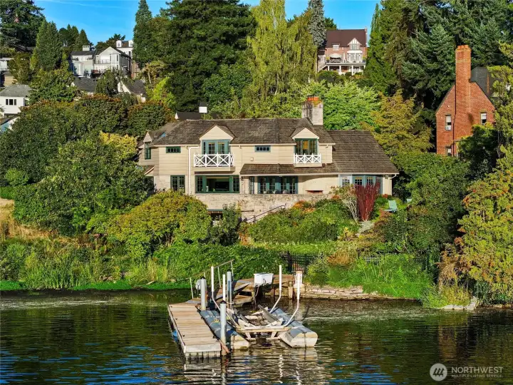 Nestled in one of Seattle’s most coveted neighborhoods, this enchanting Laurelhurst waterfront estate offers the rare combination of timeless architecture, serene privacy, and unmatched lakefront access.