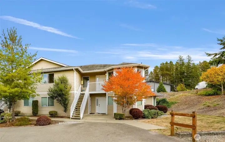 The unit is the top unit behind the beautiful fall foilage.