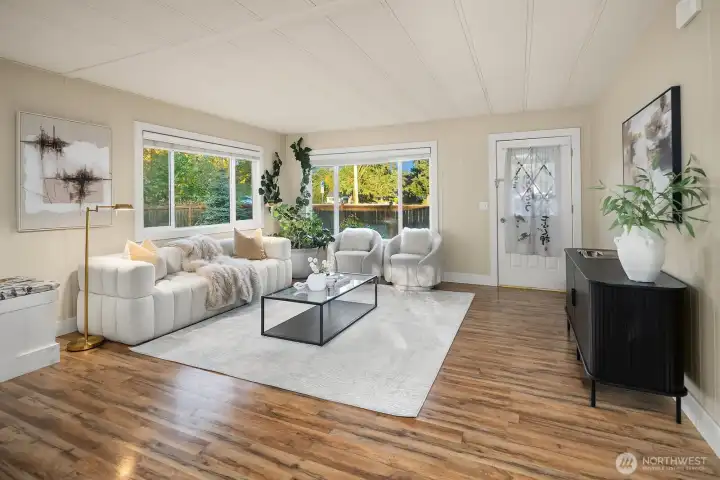 Living Room with exterior door to backyard