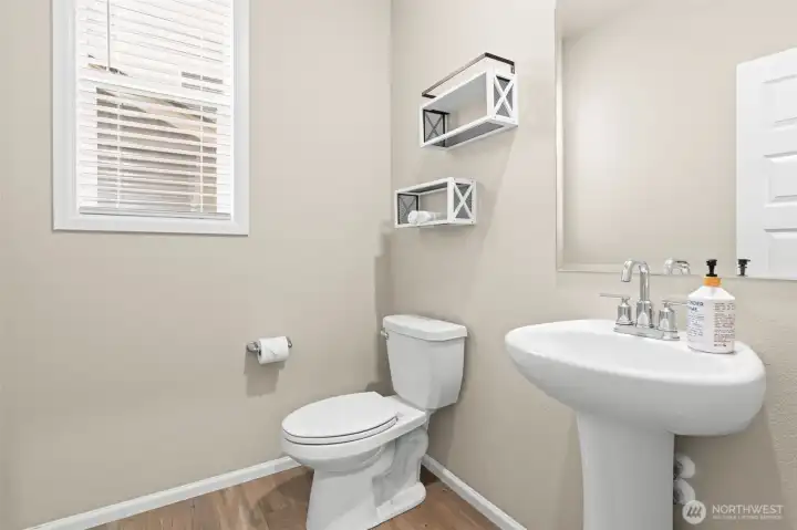 Main level powder room next to the office. Perfect for guests.