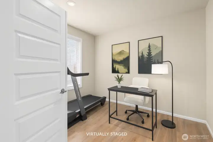 French doors open to the office or den, just off to the side as you walk through the front door.