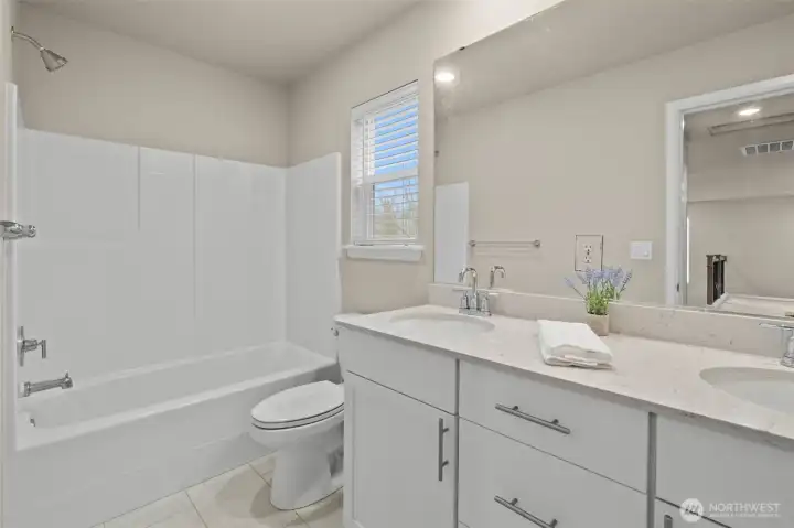 Full bathroom #2 (of 3) in the upstairs hall, near the 2nd and 3rd bedrooms.