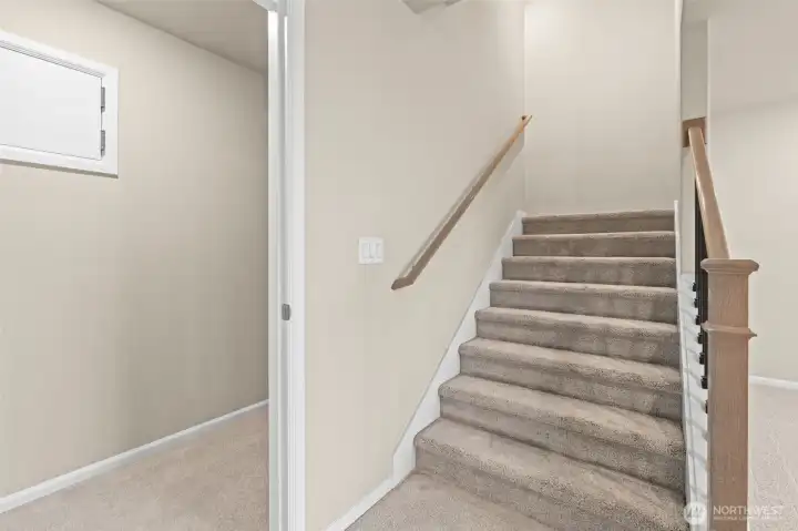 Huge storage closet behind the lower level stairs.