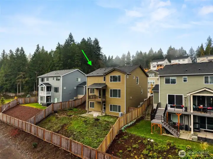 Fully fenced backyard just needs your vision.