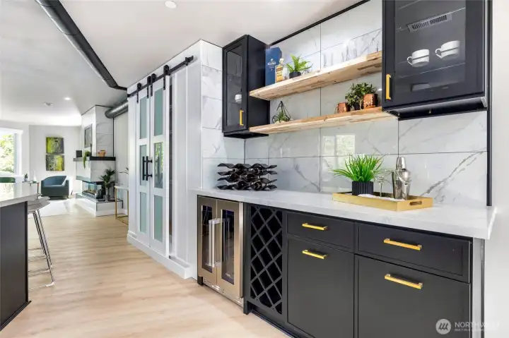 Home comes with full set of high-end kitchen appliances + this convenient wine/beverage refrigerator and wine racking system.