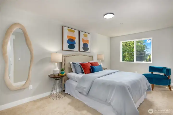 One of the four bedrooms on the upper level.