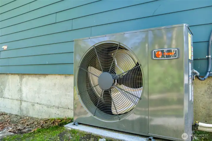 This home stays COOL all year round - thanks to the high efficiency heat pump and mini-splits