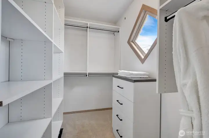 Walk-in Closet In The Primary Bedroom