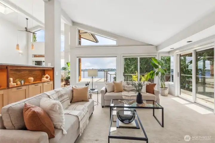 You'll want to stay forever in this living room with beautiful architecture, big views and cozy fireplace