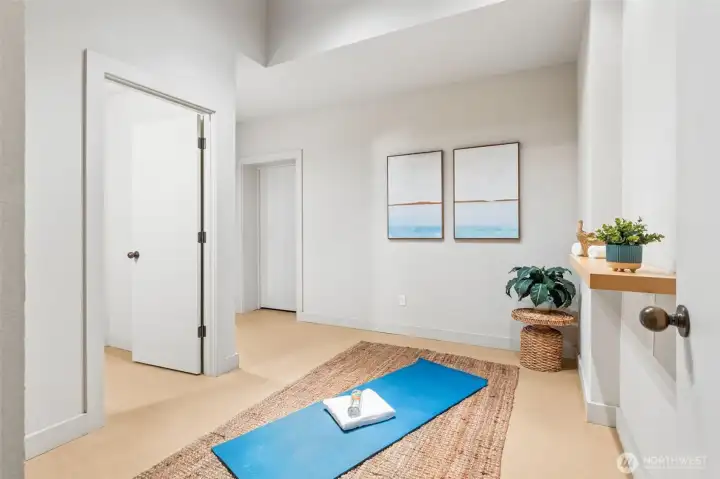 Lower level entry from garage where you'll find an area suitable for exercise bike or treadmill along with another 1/2 bath.  PLUS there's a very large fully finished storage room that is frosting on the cake!