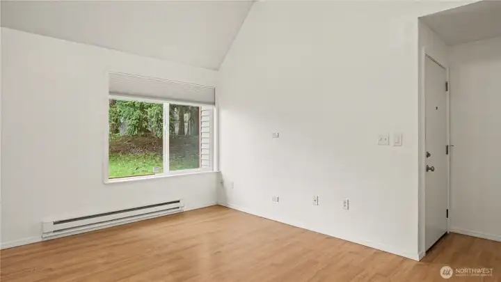 Tons of light pours through this large window and brightens the room.