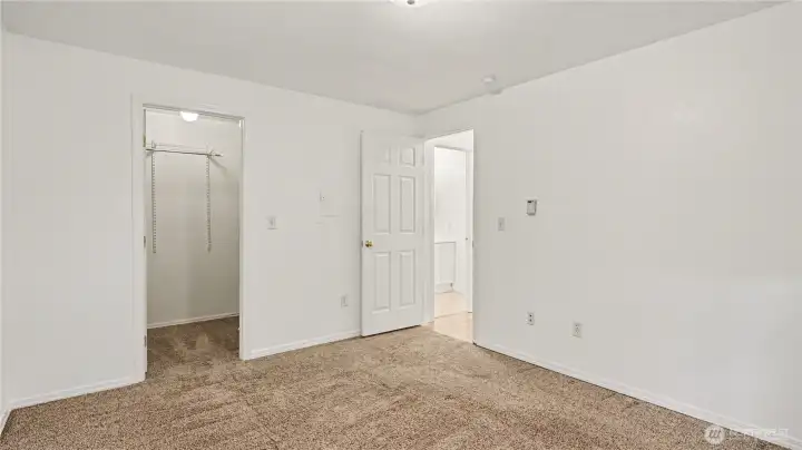 Spacious primary with plenty of light and sizable closet.
