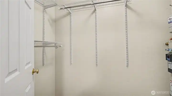 Closet offers ample space for everyday essentials.