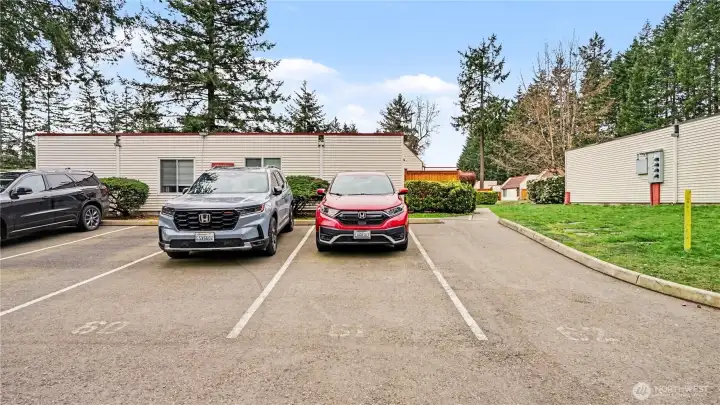 The unit also includes a designated parking space conveniently located right out front.