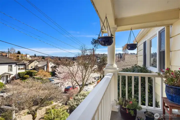 Sweeping views of the Cascades, Mt Rainier, the Ship Canal bridge and surrounding areas from the front porch