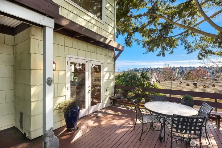Large, private deck off the kitchen with amazing views of the Mt Rainier and the Olympics and overlooking the serene, park-like backyard