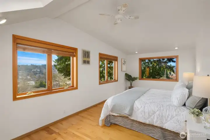Huge primary bedrooms with sweeping views of the Cascades, Mt Rainier, the Ship Canal bridge and the surrounding areas east, west and south