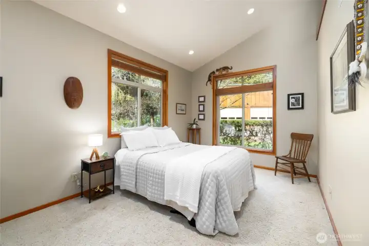 Primary suite #1.  This suite also has a walk-in closet and a door to a private stone patio.