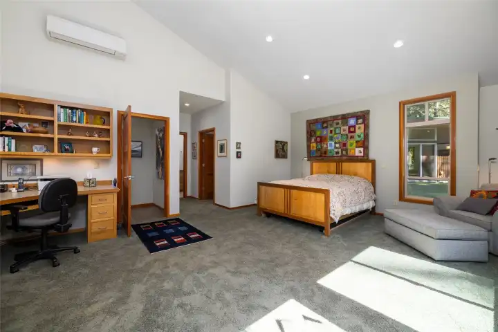 Primary Suite #2, showing the full office/sitting room/bedroom area, with walk-in closet and private bath down the right side hall.