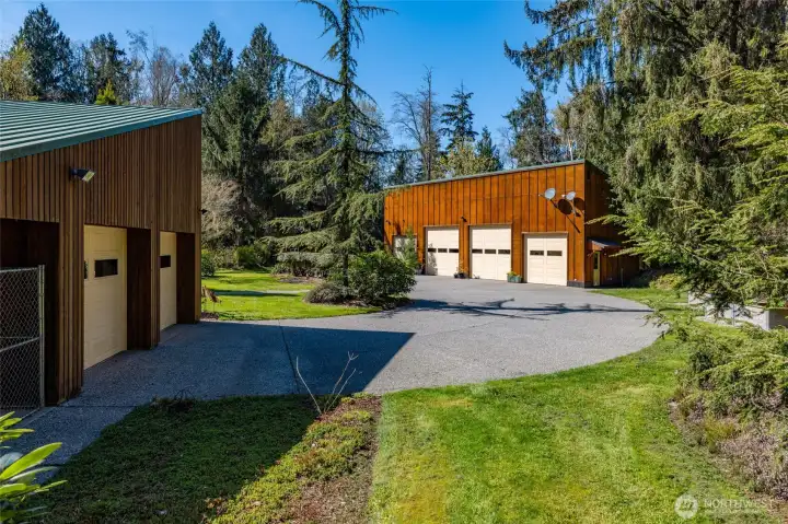 The 30x60 shop at right.  Home's attached garage and dog kennel at left.