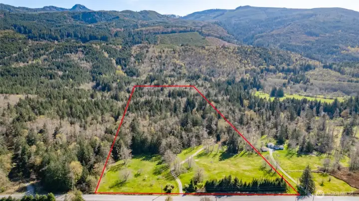 Red lines are APPROXIMATE boundary of the 3 included parcels.  Parcel to the right is not for sale, but seller would consider selling as a package deal to same buyer.  Forested lands to the left are state Natural Resource Lands.