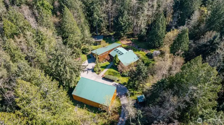 The homesite...well maintained buildings, lush landscaping, an idyllic retreat.