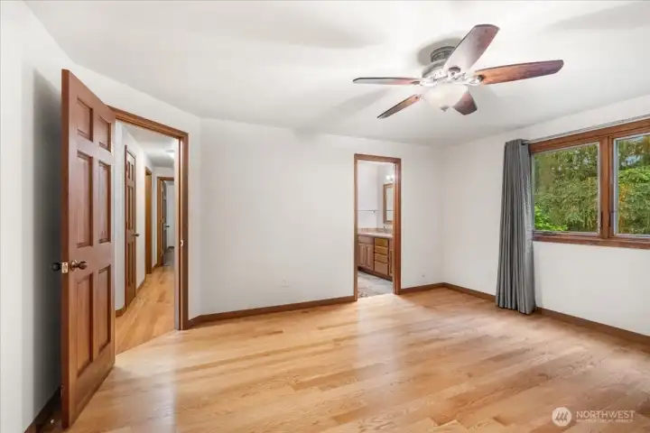 This is the primary bedroom which includes a remodeled primary bath.