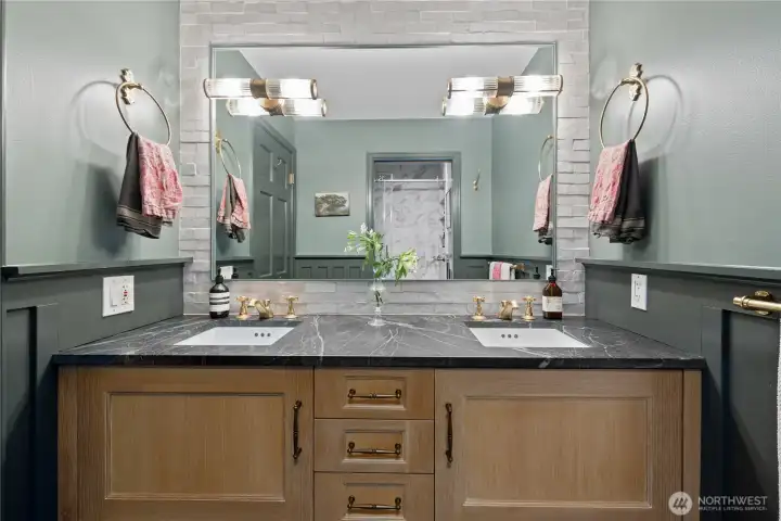 Guest bathroom. Dual vanity, Belgian Blue Stone floors and Belgian Soapstone Counter.