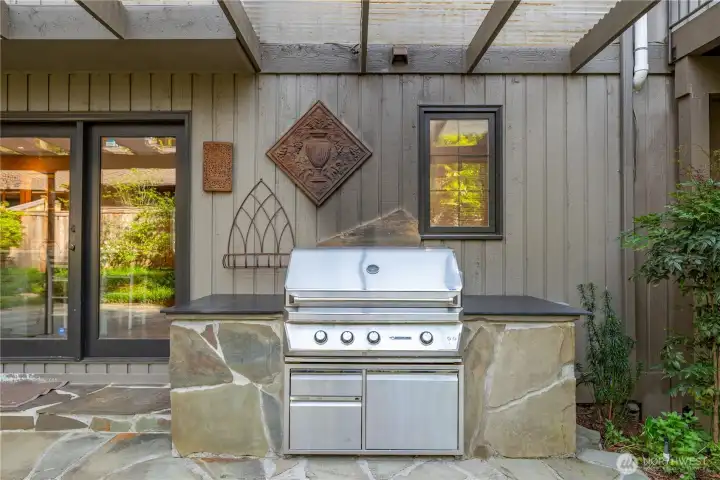 Covered and built in BBQ with natural gas.