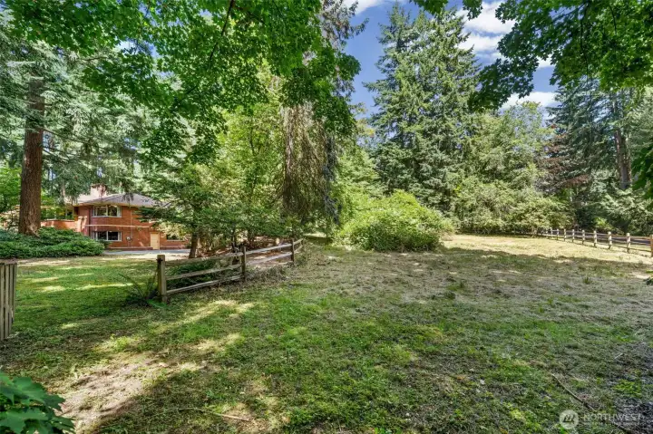 Enjoy nearly 1.75 acres of usable space with a level yard and open pasture views. A rare find in Bellevue offering privacy, space on every side, and a true connection to nature.