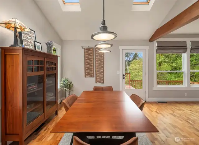 Open concept dining area with skylights.