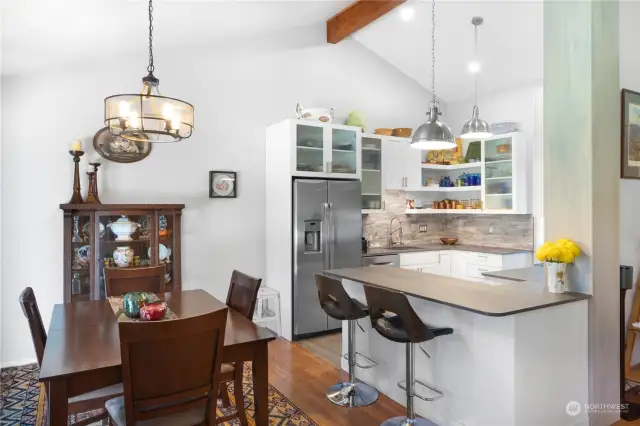 During remodeling the sellers tore out the dropped ceiling and discovered the vaulted ceiling! This room now feels bigger and as taller and more ample shelving space.