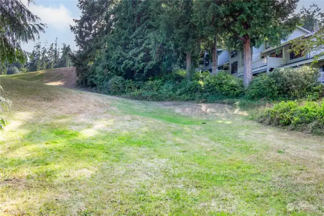 A view of the condo building from the 9th fairway at the Port Ludlow Golf Course.