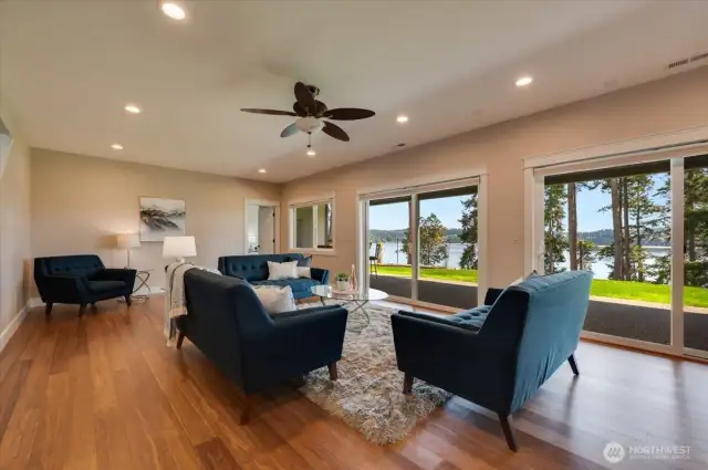 Lower level family room with 2 sliders to patio offers amazing flexibility