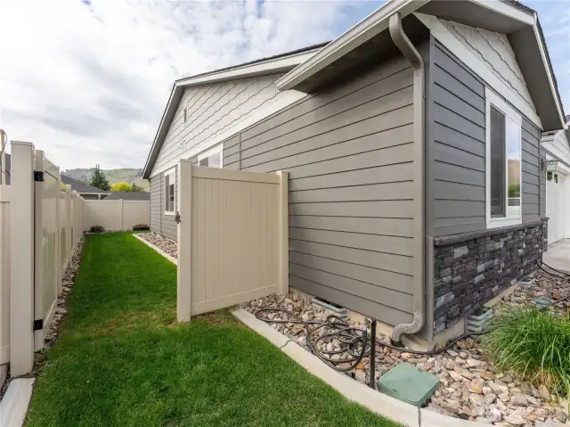 Side yard with gate to rear yard