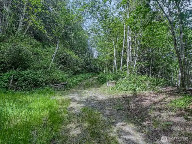 As you come up the hill, the two cement blocks indicate the start of Lot 1