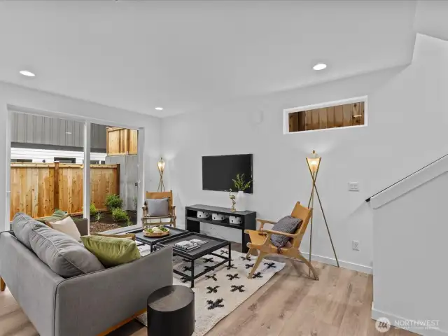 Living space with sliders to private yard