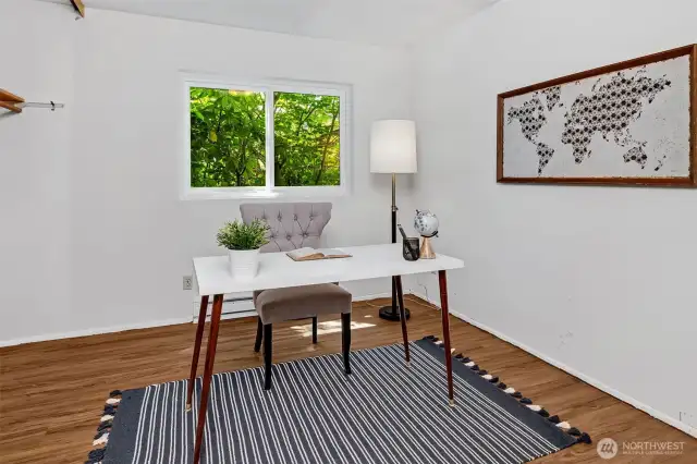 The second bedroom is staged as an office, and is also quite large.