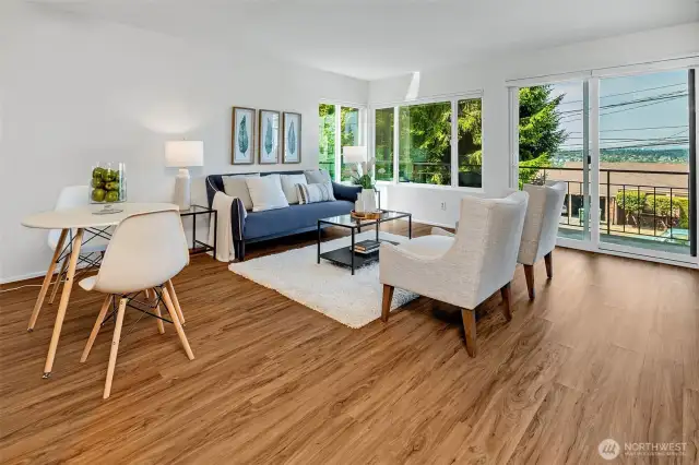 The living space is features and open floorplan and light and bright. The deck faces West and the sunsets are incredible over the Olympics and the Sound.