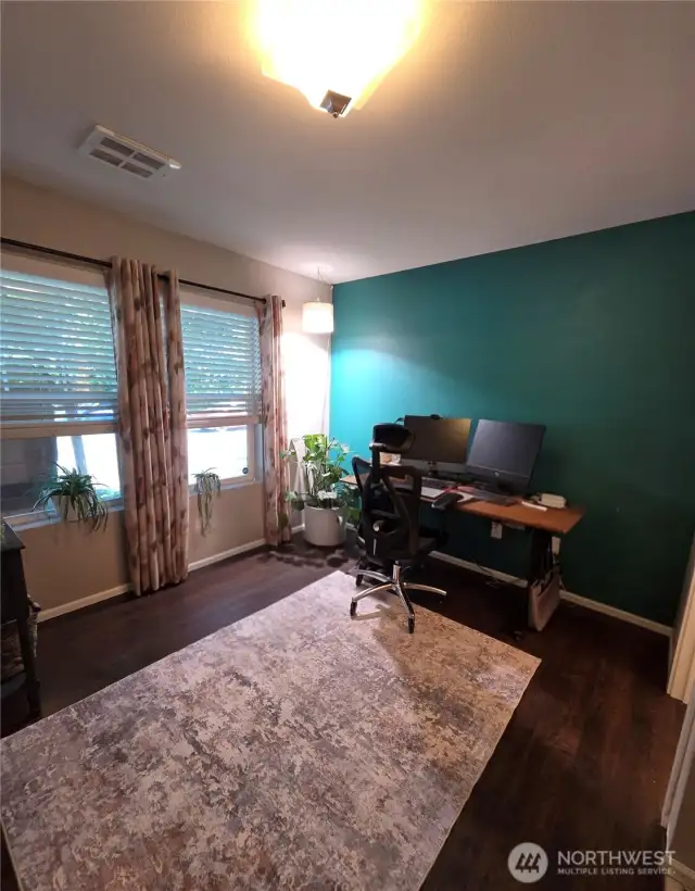 Perfect Bonus room or  Office Area with a half bath & direct access to the garage.
