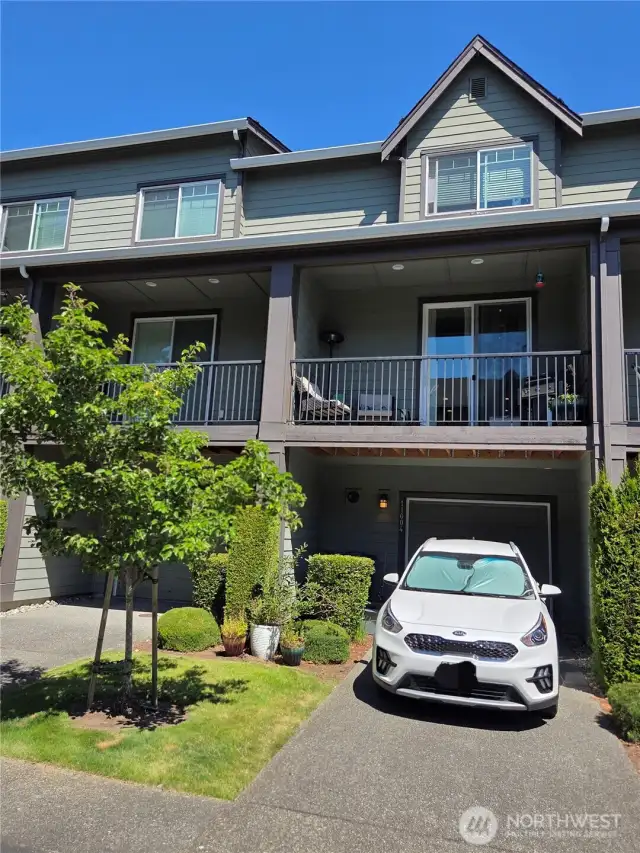 1 Car Garage with Balcony above.