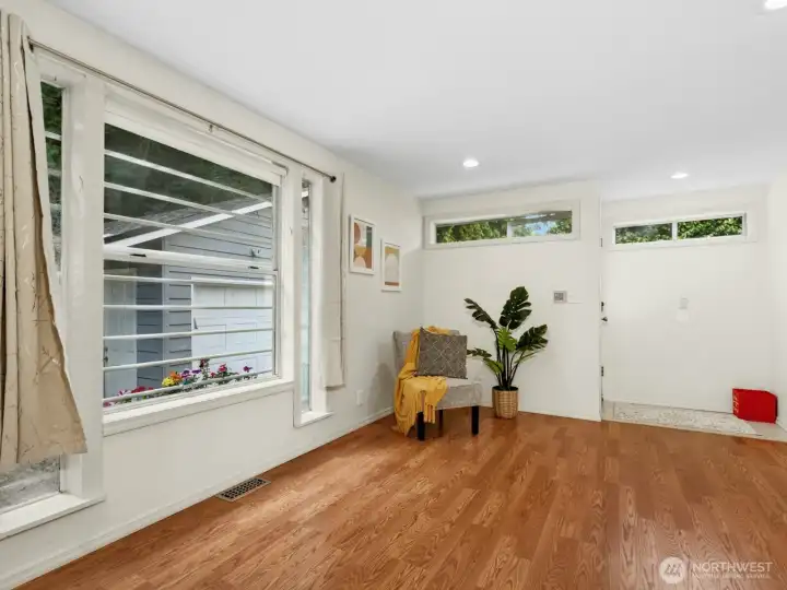 Family Room facing the Rear Exit and has a good view to the small garden area at the rear of the house
