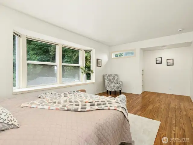 2F Main Bed view faces the peaceful greenbelt behind the property.
