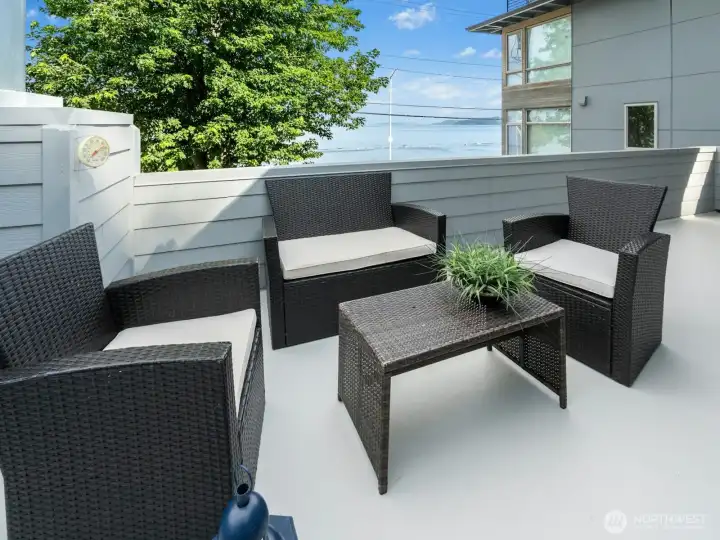 2F Balcony entering from the Sitting Room, facing Alki Ave with amazing Puget Sound and Mountain views.
